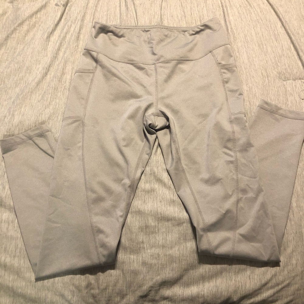 Reebok light grey leggings with pockets.